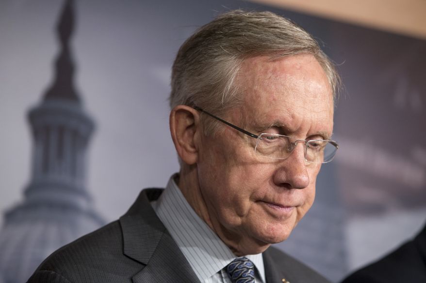 **FILE** Senate Majority Leader Harry Reid, D-Nev., tells reporters that Speaker of the House John Boehner, R-Ohio, and House Republicans are the obstacle to ending the government shutdown crisis, at the Capitol in Washington, Thursday, Oct. 3, 2013. President Barack Obama brought congressional leaders to the White House on Wednesday for the first time since a partial government shutdown began, but there was no sign of progress toward ending an impasse that has idled 800,000 federal workers and curbed services around the country. (AP Photo/J. Scott Applewhite)