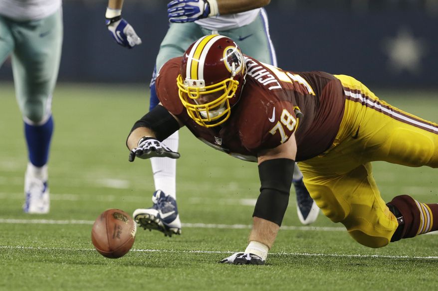 Washington Redskins guard Kory Lichtensteiger (78) recovers a fumble in second half of an NFL football game against the Dallas Cowboys Sunday, Oct. 13, 2013, in Arlington, Texas. (AP Photo/LM Otero)