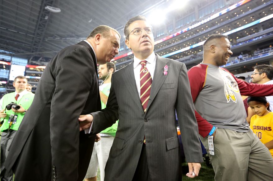 Washington Redskins owner Daniel Snyder visits with fans before an NFL football game against the Dallas Cowboys Sunday, Oct., 13, 2013, in Arlington, Texas. (AP Photo/LM Otero)