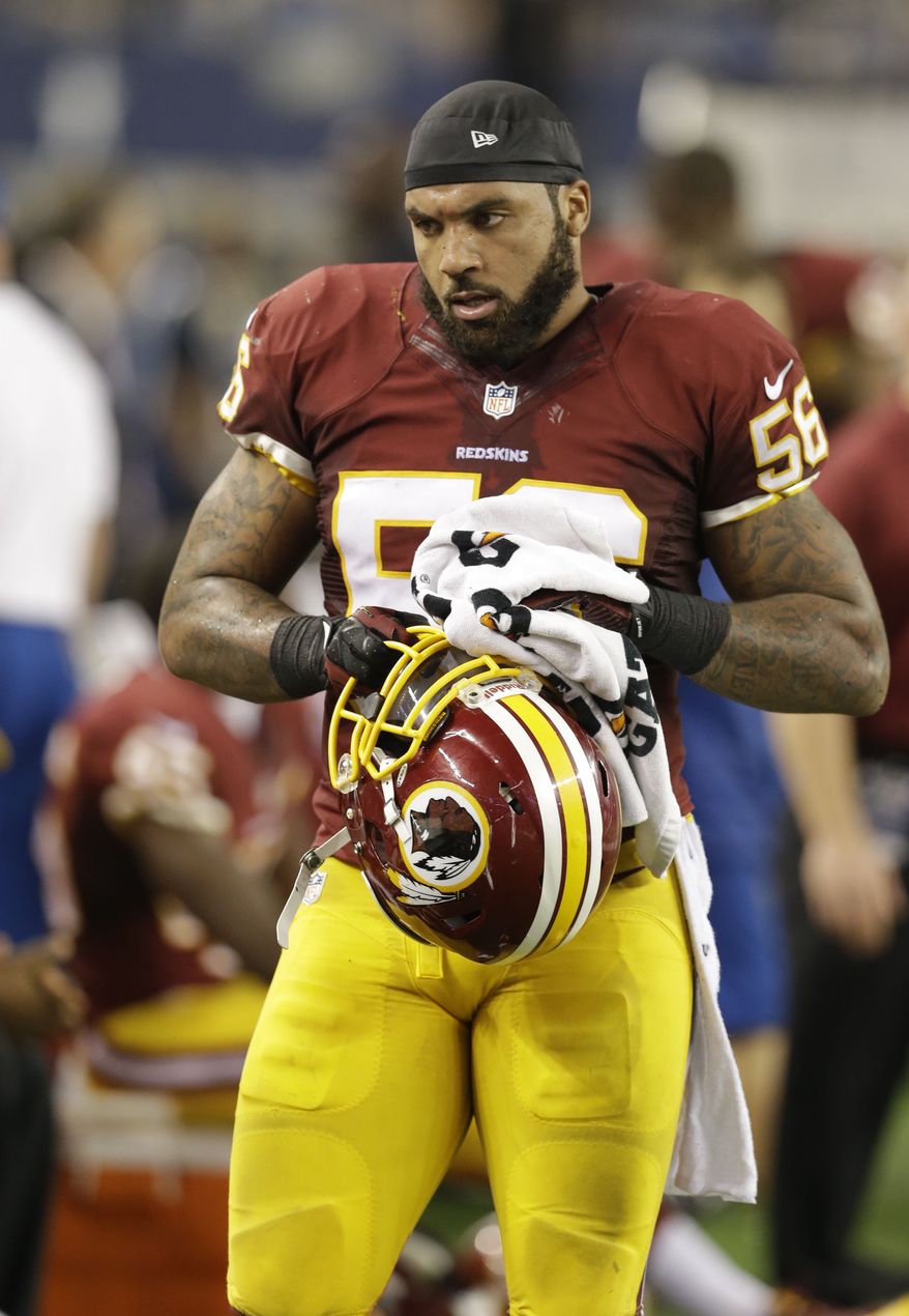 Washington Redskins inside linebacker Perry Riley (56) walks the sideline during the second half of an NFL football game against the Dallas Cowboys Sunday, Oct. 13, 2013, in Arlington, Texas. (AP Photo/LM Otero)