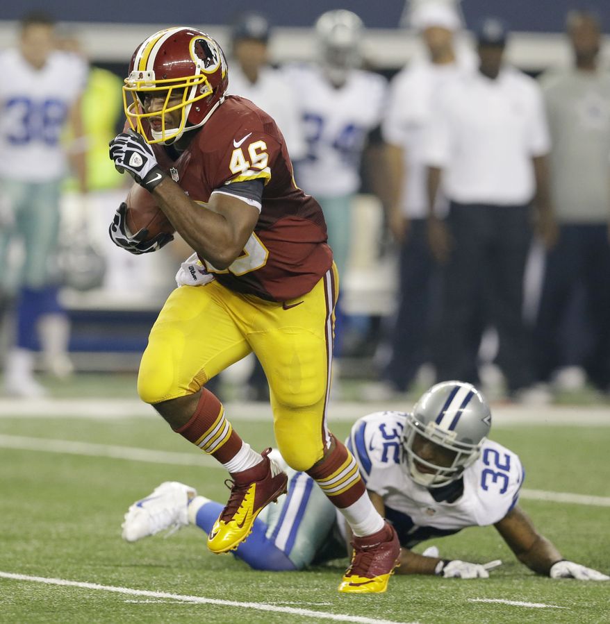 Washington Redskins running back Alfred Morris (46) is beats Dallas Cowboys cornerback Orlando Scandrick (32) during the second half of an NFL football game Sunday, Oct. 13, 2013, in Arlington, Texas. (AP Photo/LM Otero)