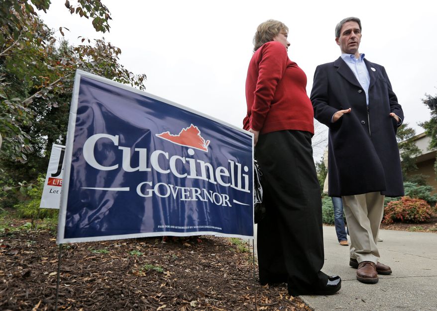 Virginia Attorney General Kenneth T. Cuccinelli II, the Republican candidate for governor, talks to voters at the Atlee High School voting place in Hanover on Tuesday.