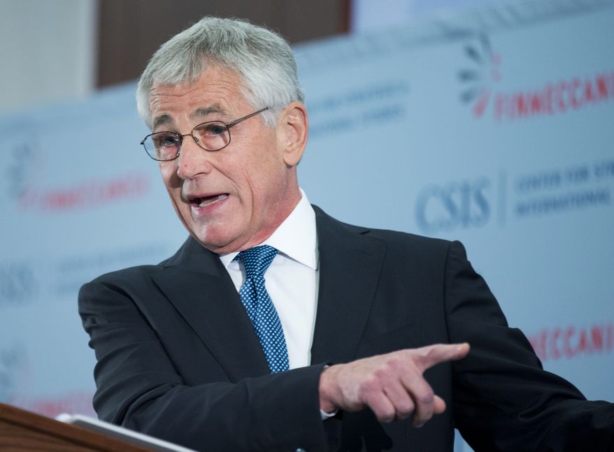 Defense Secretary Chuck Hagel speaks at the Center for Strategic and International Studies (CSIS), in Washington, Tuesday, Nov. 5, 2013. Hagel said the projected defense budget cuts of nearly $1 trillion over 10 years is too much, too fast, and will cause a dangerous erosion of U.S. military power. In a speech about U.S. defense priorities, Hagel said Tuesday that it would be a mistake to let these cuts happen. But he also said officials are not assuming the government's budget crisis will be resolved soon. (AP Photo/Manuel Balce Ceneta)