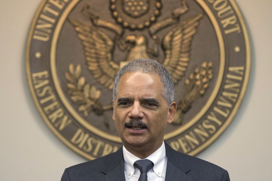 Attorney General Eric H. Holder Jr. speaks during a news conference on Tuesday, Nov. 5, 2013, at the U.S. Courthouse in Philadelphia. (AP Photo/Matt Rourke)