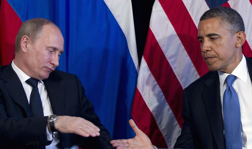 President Obama and Russian President Vladimir Putin (Associated Press) ** FILE **