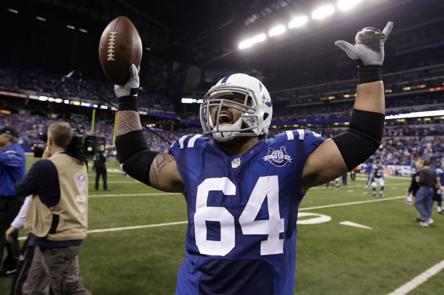 Indianapolis Colts center Samson Satele celebrates after an NFL wild-card playoff football game Saturday, Jan. 4, 2014, in Indianapolis. Indianapolis defeated Kansas City 45-44. (AP Photo/Michael Conroy)