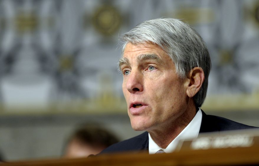 **FILE** Sen. Mark Udall, Colorado Democrat (Associated Press)