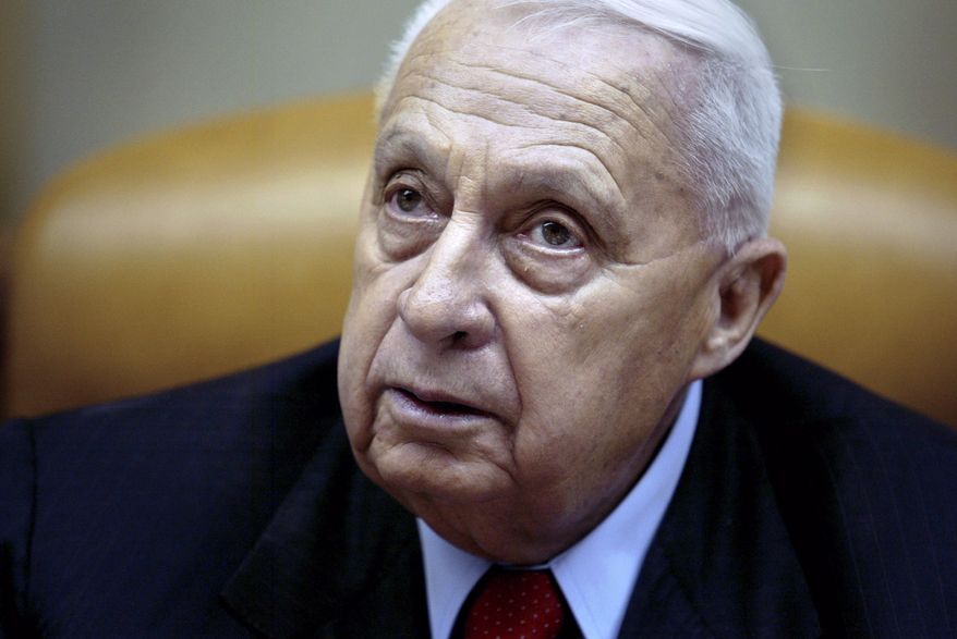 FILE - In this Sunday Jan. 30, 2005 file photo, Israeli Prime Minister Ariel Sharon pauses during the weekly cabinet meeting in his Jerusalem office. The Israeli hospital treating Sharon said Thursday, Jan. 9, 2014 that the former prime minister has deteriorated further and he is now in ‘grave’ condition. Sharon, who has been comatose since suffering a stroke eight years ago, suffered a downturn in his health last week with a decline in key bodily organs.(AP Photo/Oded Balilty, Pool, File)