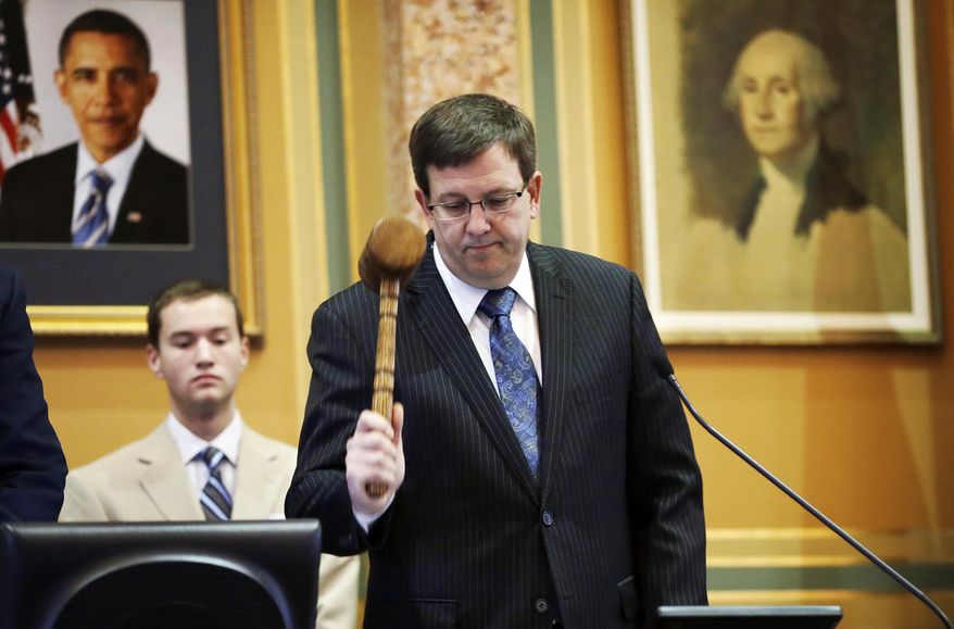 Republican House Speaker Kraig Paulsen, of Hiawatha, pounds the gavel during the opening day of the Iowa Legislature, Monday, Jan. 13, 2014, at the Statehouse in Des Moines, Iowa. (AP Photo/Charlie Neibergall)