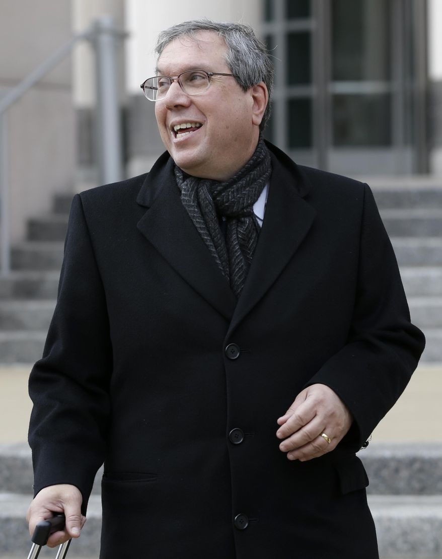 National Football League Players Association attorney Jeffrey L. Kessler walks out of federal court after presenting oral arguments before a three-judge panel of the 8th U.S. Circuit Court of Appeals, Tuesday, Jan. 14, 2014, in St. Louis. The hearing addressed a claim by the NFLPA that the league colluded to set a secret salary cap in 2010 and follows a recent ruling by a federal judge rejecting the union's attempt to reopen a lawsuit that guided league labor matters from 1993 until the new collective bargaining agreement in 2011. (AP Photo/Jeff Roberson)