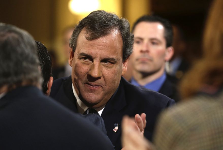 New Jersey Gov. Chris Christie arrives to deliver his State Of The State address at the Statehouse, Tuesday, Jan. 14, 2014, in Trenton, N.J. Faced with a widening political scandal that threatens to undermine his second term and a possible 2016 presidential run, Christie apologized again Tuesday, saying his administration "let down the people we are entrusted to serve" but that the issue doesn't define his team or the state. (AP Photo/Julio Cortez)