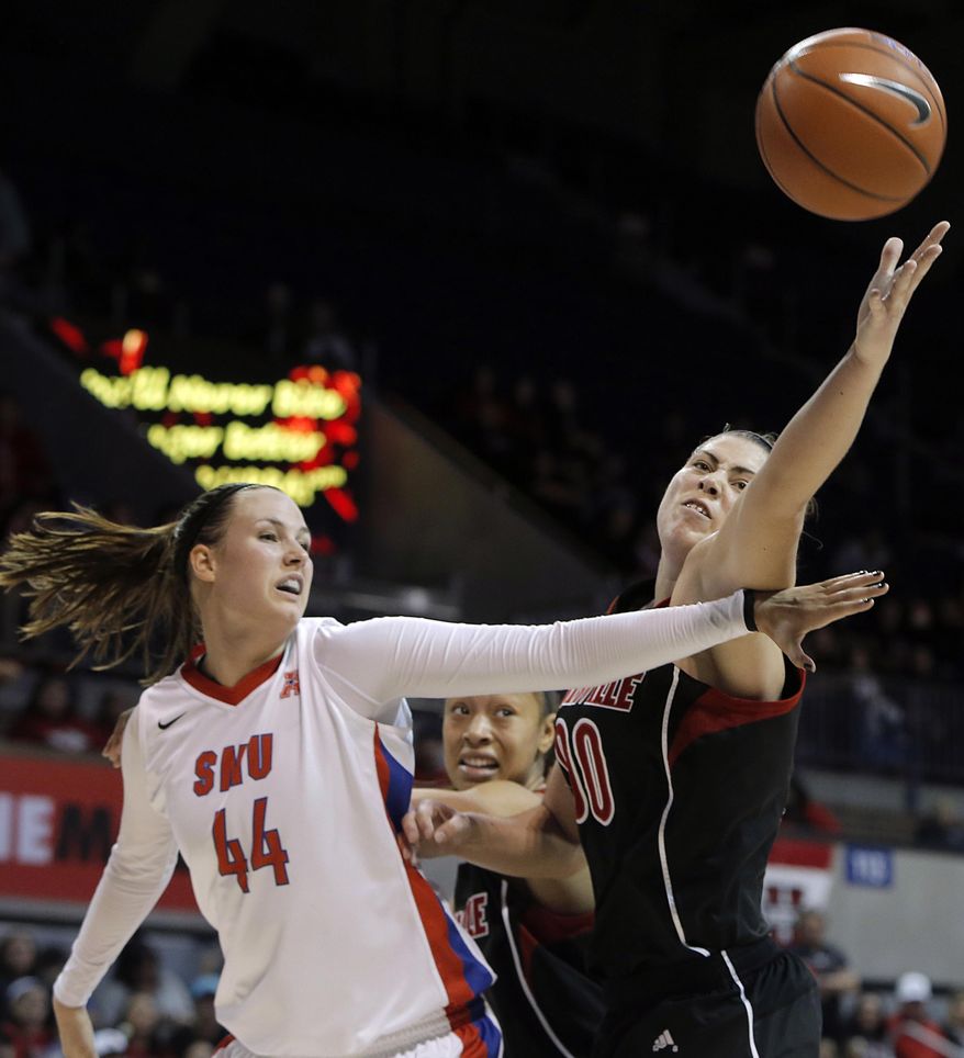 SMU guard Mallory Singleton (44) and Louisville forward Sara Hammond (00) battle for a rebound in the first half of an NCAA college basketball game on Sunday, Jan. 19, 2014, in Dallas. (AP Photo/Brandon Wade)