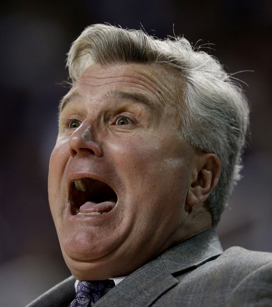 Kansas State coach Bruce Weber questions a call during the first half of an NCAA college basketball game against West Virginia Saturday, Jan. 18, 2014, in Manhattan, Kan. (AP Photo/Charlie Riedel)