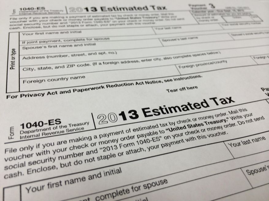 This Thursday, Jan. 9, 2013, photo, shows a 2013 1040-ES IRS Estimated Tax form at H&R Block tax preparation office in the Echo Park district of Los Angeles. (AP Photo/Damian Dovarganes) ** FILE **
