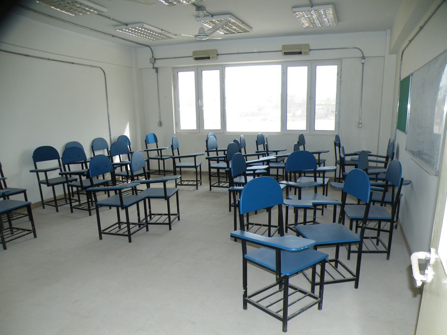 Balkh Education Facility classroom in Afghanistan.
In the latest aid problem in Afghanistan, investigators found that a school built for the Balkh province is still unfinished, with structural issues that could pose a danger to students and teachers.
“Nearly 5 years after construction began, the U.S. Agency for International Development (USAID) is unable to transfer the facility to Afghan authorities,†said the Special Inspector General for Afghanistan Reconstruction.
The school needs repairs to “a leaking roof, defective electrical wiring, and an improperly sloped terrace roof,†inspectors said, adding that sewer pipes near water sources aren't properly insulated, raising the possibility of contamination.
They're also concerned about whether the roof and septic system are designed to hold the weight imposed on them, and that officials cannot assure that the structure “will not collapse at some point in time.â€
USAID disagreed that the building is structurally unsound. The Army Corps of Engineers which built the school, has “rigorous procedures and requirements for the design and construction of its building projects.â€
The aid agency did agree that work on the school is incomplete, and said they will fix any remaining problems with the building.
The school has yet to be approved for use, but classes were held in the building in 2013. In response, USAID secured the facility to make sure no one used it, but SIGAR noted that Afghan authorities are not pleased about the ongoing delays.
The original contract to build the school was just under $3 million, part of a $17.1 million program to build a system of educational facilities across Afghanistan.