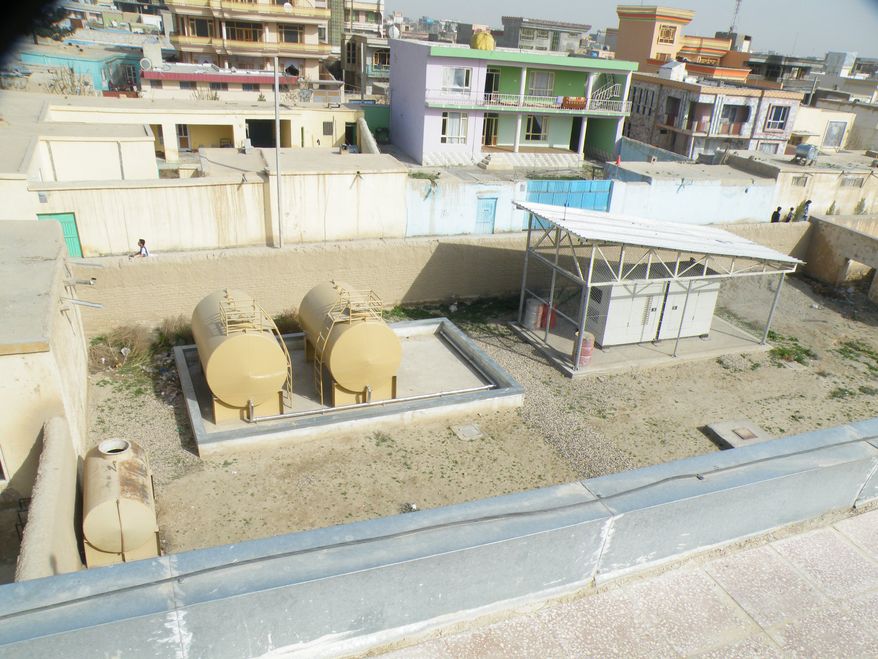 Balkh Education Facility 2 in Afghanistan.
In the latest aid problem in Afghanistan, investigators found that a school built for the Balkh province is still unfinished, with structural issues that could pose a danger to students and teachers.
“Nearly 5 years after construction began, the U.S. Agency for International Development (USAID) is unable to transfer the facility to Afghan authorities,†said the Special Inspector General for Afghanistan Reconstruction.
The school needs repairs to “a leaking roof, defective electrical wiring, and an improperly sloped terrace roof,†inspectors said, adding that sewer pipes near water sources aren't properly insulated, raising the possibility of contamination.
They're also concerned about whether the roof and septic system are designed to hold the weight imposed on them, and that officials cannot assure that the structure “will not collapse at some point in time.â€
USAID disagreed that the building is structurally unsound. The Army Corps of Engineers which built the school, has “rigorous procedures and requirements for the design and construction of its building projects.â€
The aid agency did agree that work on the school is incomplete, and said they will fix any remaining problems with the building.
The school has yet to be approved for use, but classes were held in the building in 2013. In response, USAID secured the facility to make sure no one used it, but SIGAR noted that Afghan authorities are not pleased about the ongoing delays.
The original contract to build the school was just under $3 million, part of a $17.1 million program to build a system of educational facilities across Afghanistan.