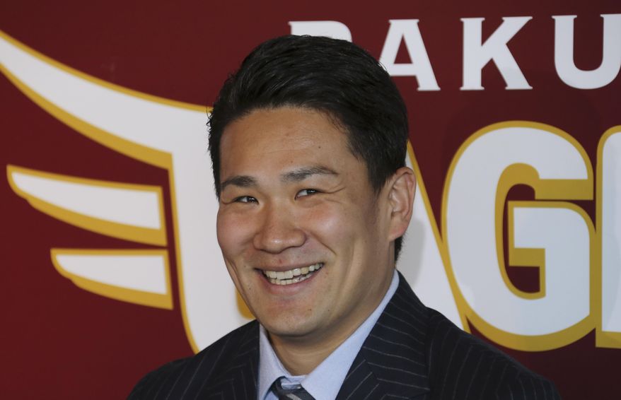 Japanese pitcher Masahiro Tanaka speaks during a press conference at the Rakuten Eagles' stadium in Sendai, northeastern Japan, Thursday, Jan. 23, 2014. The 25-year-old right-hander said he chose to play for the New York Yankees because they appreciated him the most. Speaking after agreeing a $155 million, seven-year deal with the Yankees, Tanaka said "they gave me the highest evaluation and are a world-famous team." (AP Photo/Koji Sasahara)