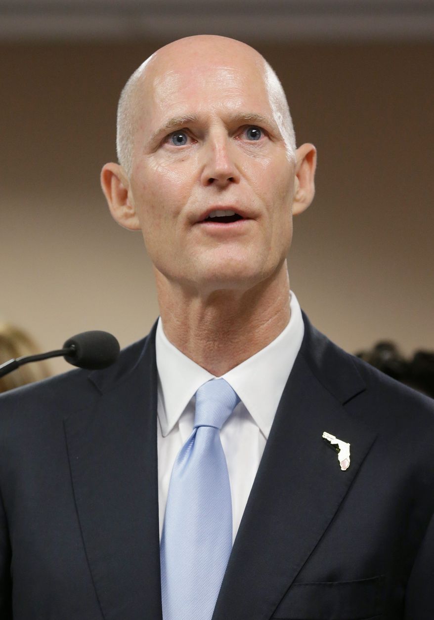 Florida Gov. Rick Scott has a fortified ground game for his re-election campaign. The Republican likely will face former Gov. Charlie Crist, a Republican turned independent turned Democrat. (Associated Press)