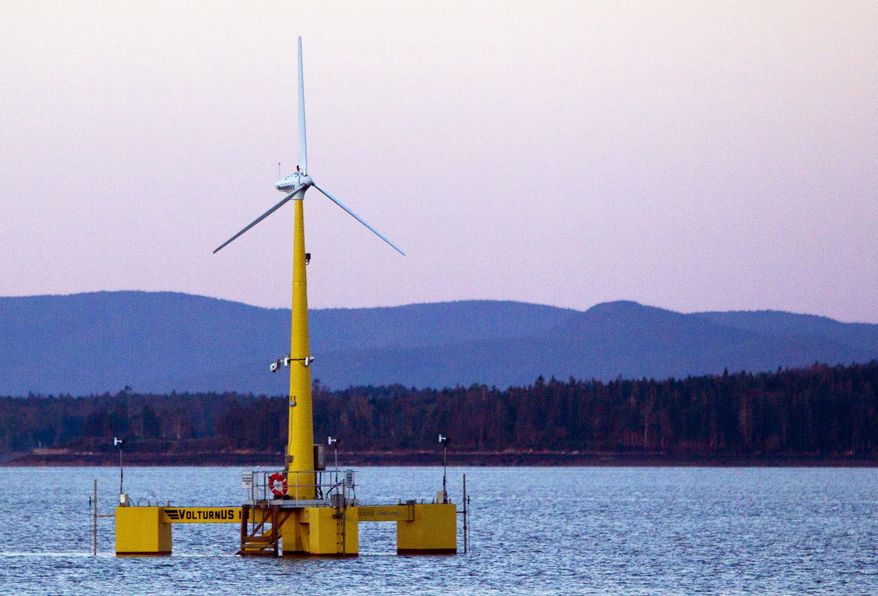 FILE - This Friday, Sept. 20, 2013 file photo shows the country's first floating wind turbine works off the coast of Castine, Maine. Oregon and federal officials are announcing a new effort to tap into offshore wind energy resources in federal waters along the West Coast. Gov. John Kitzhaber, U.S. Secretary of the Interior Sally Jewell and Bureau of Ocean Energy Management Director Tommy Beaudreau are making the announcement at a press conference Wednesday, Feb. 5, 2014. (AP Photo/Robert F. Bukaty, File)