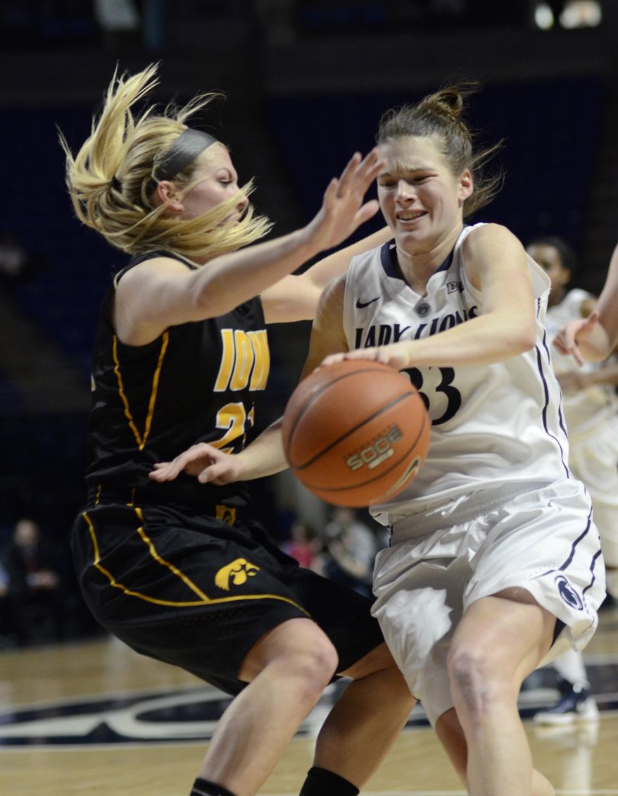 Penn State's Maggie Lucas (33) is fouled by Iowa's Kali Peschel (25) during first half of an NCAA college basketball game on Thursday, Feb. 6, 2014 in State College, Pa. (AP Photo/Ralph Wilson)