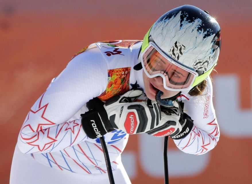 United States' Jacqueline Wiles rests after a women's downhill training run for the Sochi 2014 Winter Olympics, Saturday, Feb. 8, 2014, in Krasnaya Polyana, Russia. (AP Photo/Gero Breloer)