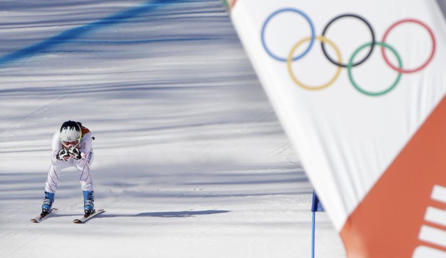 United States' Jacqueline Wiles approaches the finish in a women's downhill training run for the Sochi 2014 Winter Olympics, Saturday, Feb. 8, 2014, in Krasnaya Polyana, Russia. (AP Photo/Gero Breloer)