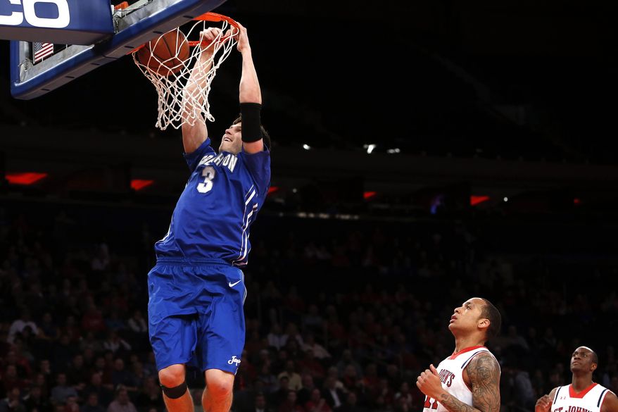 Creighton's Doug McDermott (3) goes to the basket against St. John's during the first half of an NCAA college basketball game, Sunday, Feb. 9, 2014, in New York. (AP Photo/Jason DeCrow)