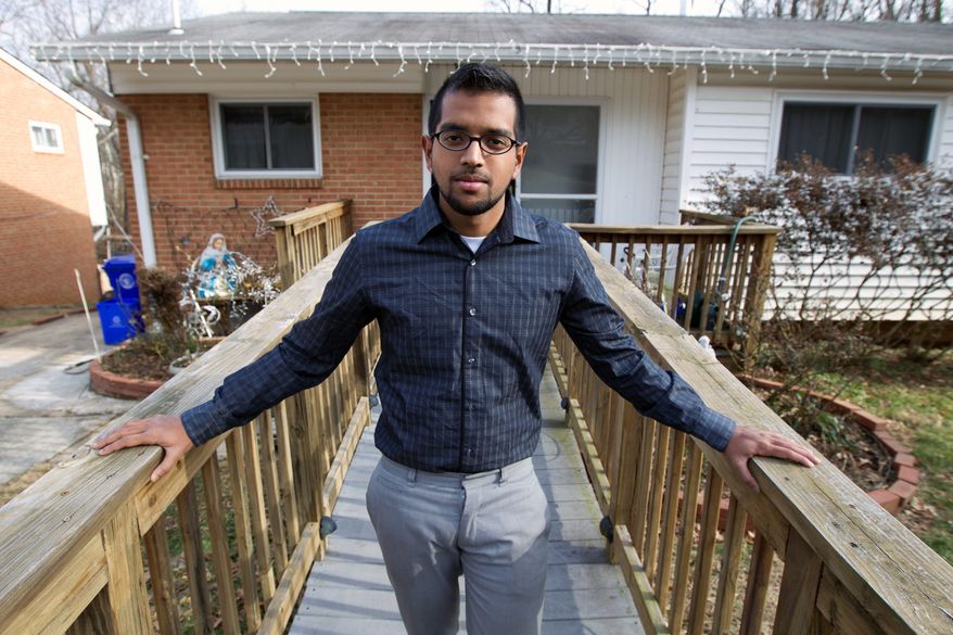 Yves Gomes, a student at the University of Maryland, who's parents were deported, poses for a photo outside his great uncle's house where he lives in Silver Spring, Md., Friday Jan. 17, 2014. Gomes says he considers himself one of the lucky ones _ lucky, at least, among the so-called "dreamers." Even though his parents were deported and his legal status was once in limbo, today the 21-year-old Indian native attends the University of Maryland paying in-state tuition. ( AP Photo/Jose Luis Magana)