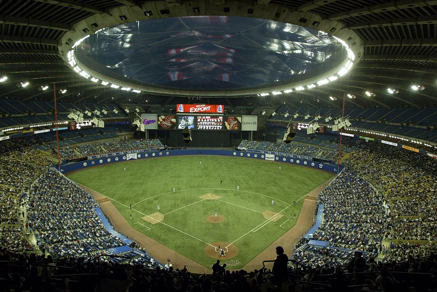 Baeball fans fill Olympic Stadium to watch the MontrealExpos play their final home game against the Florida Marlins in Montreal, Wednesday, Sept. 29, 2004. The Expos will move to Washington, D.C. for next season. (AP PHOTO/Paul Chiasson)