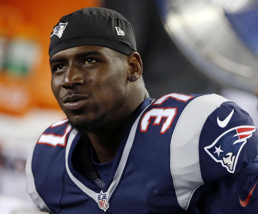 FILE - In this Aug. 29, 2013 file photo, New England Patriots cornerback Alfonzo Dennard sits on the bench during the third quarter of an NFL preseason football game against the New York Giants in Foxborough, Mass. Dennard has reported to a Lincoln, Neb., jail to begin his 60-day term for a 2012 assault on a police officer. Corrections officers with the Lancaster County Adult Detention Facility who spoke on condition of anonymity because of jail policy said Dennard reported to the Lincoln facility Saturday morning, March 1, 2014. (AP Photo/Elise Amendola, File)