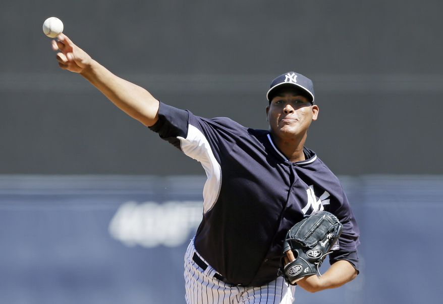 New York Yankees starting pitcher Ivan Nova throws during the first inning of an exhibition baseball game against the Washington Nationals, Monday, March 3, 2014, in Tampa, Fla. (AP Photo/Charlie Neibergall)