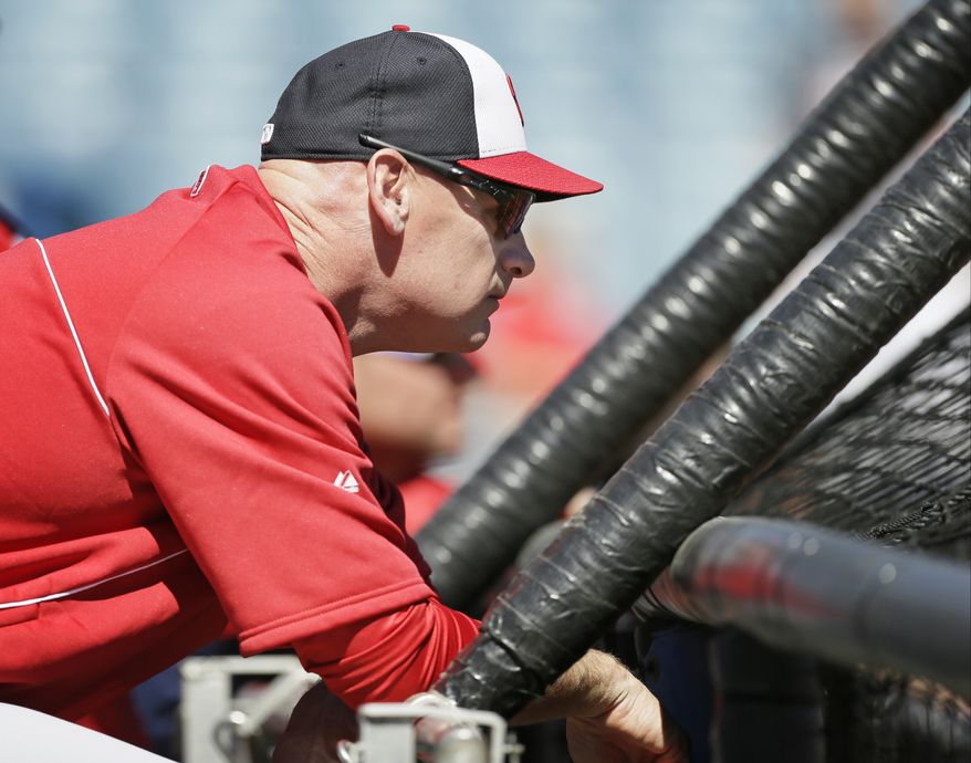 Washington Nationals manager Matt Williams watches his team take batting practice before an exhibition baseball game against the New York Yankees Monday, March 3, 2014, in Tampa, Fla. (AP Photo/Charlie Neibergall)