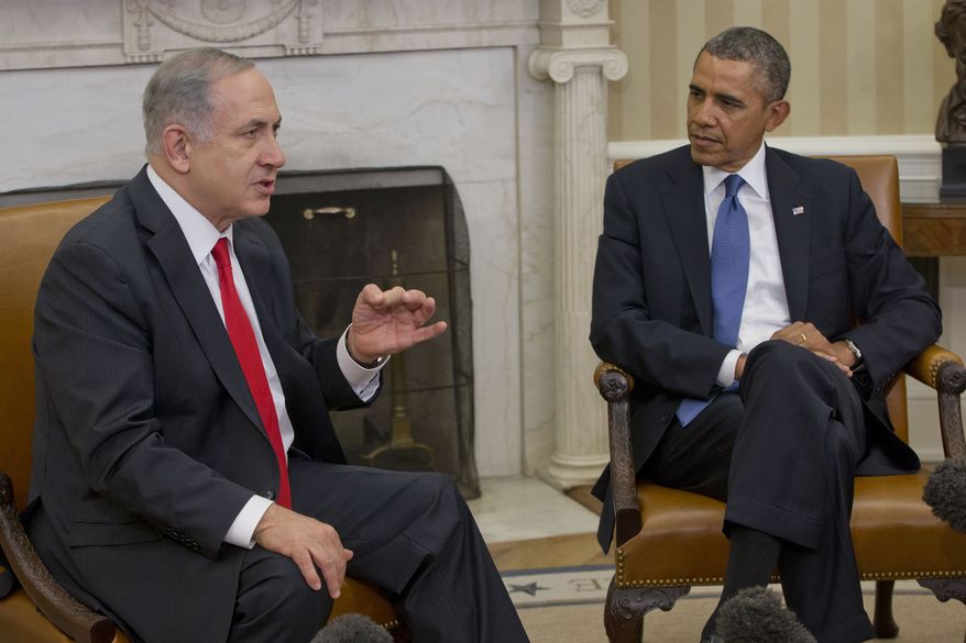 President Barack Obama listens as Israeli Prime Minister Benjamin Netanyahu speaks during their meeting in the Oval Office of the White House in Washington, Monday, March 3, 2014. Seeking to keep a pair of delicate diplomatic efforts afloat, Obama will personally appeal to Netanyahu to move forward on peace talks with the Palestinians, while also trying to manage Israel's deep suspicion of his pursuit of a nuclear accord with Iran. (AP Photo/Pablo Martinez Monsivais)