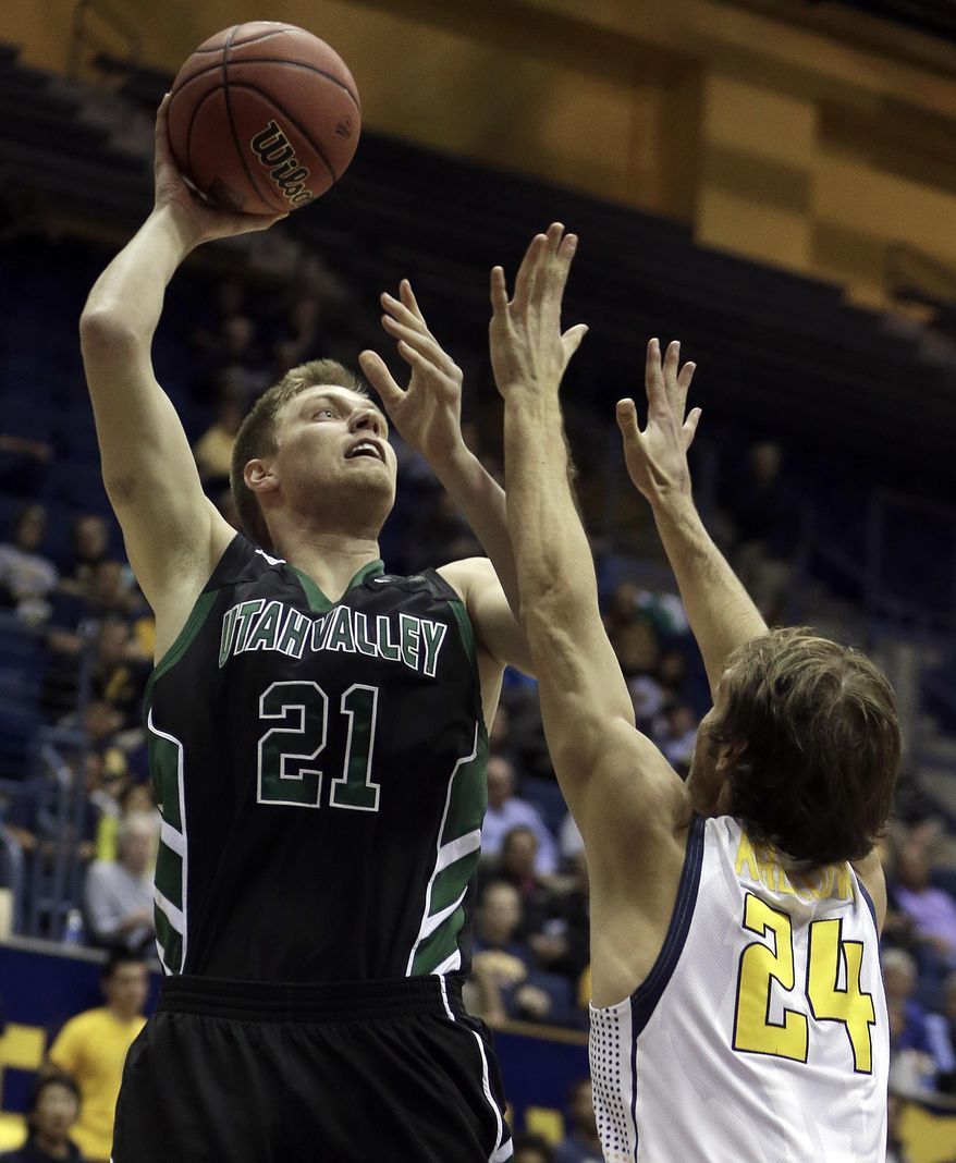 Utah Valley's Zach Nelson (21) shoots over California's Ricky Kreklow, right, in the first half of an NCAA college basketball game Wednesday, March 19, 2014, in Berkeley, Calif. (AP Photo/Ben Margot)