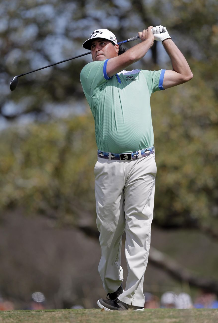 Pat Perez watches his drive off the second tee during the third round of the Texas Open golf tournament, Saturday, March 29, 2014, in San Antonio. (AP Photo/Eric Gay)