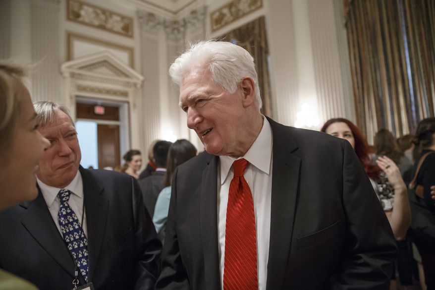 Rep. Jim Moran, D-Va., center, greets guest at a pet adoption event sponsored by the Congressional Animal Protection Caucus which he chairs to highlight animal welfare issues in Congress, on Capitol Hill in Washington, Friday, April 4, 2014. Moran said this week that “members of Congress are underpaid,” and the congressional salary of $174,000 a year for most isn’t enough for some. Moran, whose Virginia district abuts Washington, says he will offer an amendment to legislation to fund Congress' budget next week to help lawmakers with the cost of living. (AP Photo/J. Scott Applewhite)