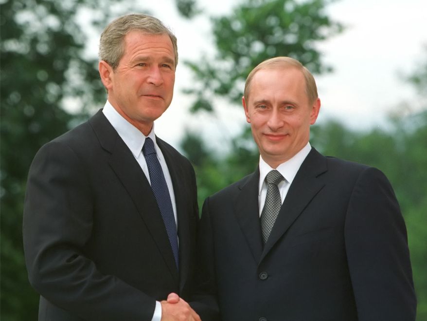 Former President George W. Bush and Russian leader Vladimir Putin.