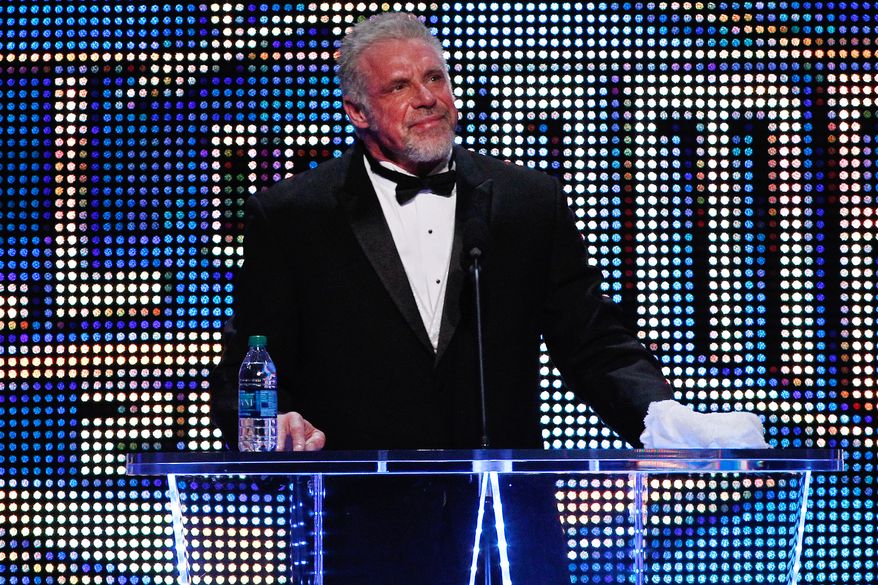 The Ultimate Warrior speaks during the WWE Hall of Fame Induction at the Smoothie King Center in New Orleans on Saturday, April 5, 2014. (Jonathan Bachman/AP Images for WWE)