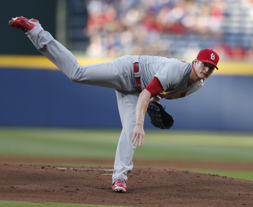 St. Louis Cardinals starting pitcher Shelby Miller (40) works against the Atlanta Braves in the first inning of a baseball game Monday, May 5, 2014 in Atlanta. (AP Photo/John Bazemore)