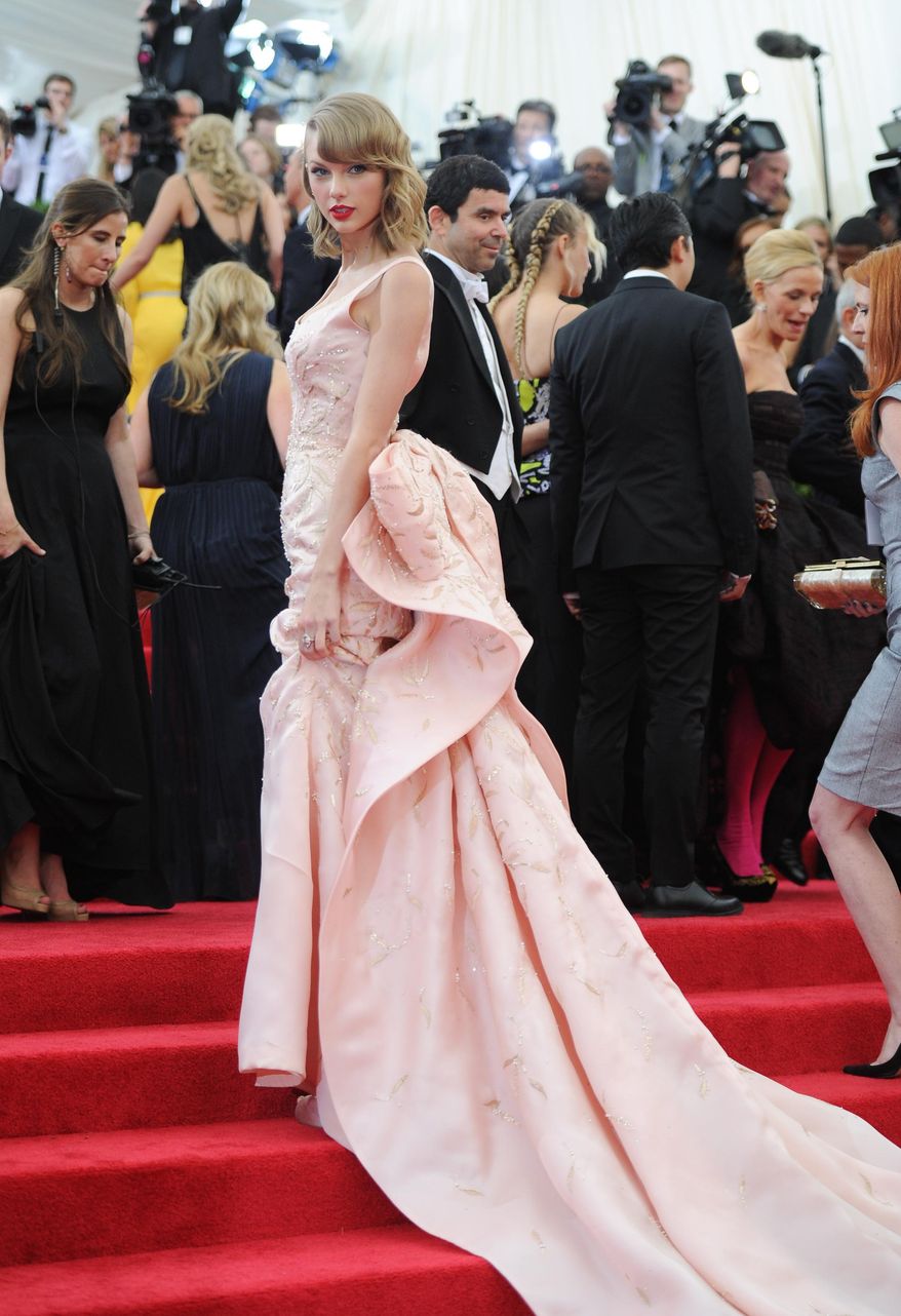 Singer Taylor Swift attends The Metropolitan Museum of Art's Costume Institute benefit gala celebrating "Charles James: Beyond Fashion" on Monday, May 5, 2014, in New York. (Photo by Evan Agostini/Invision/AP)
