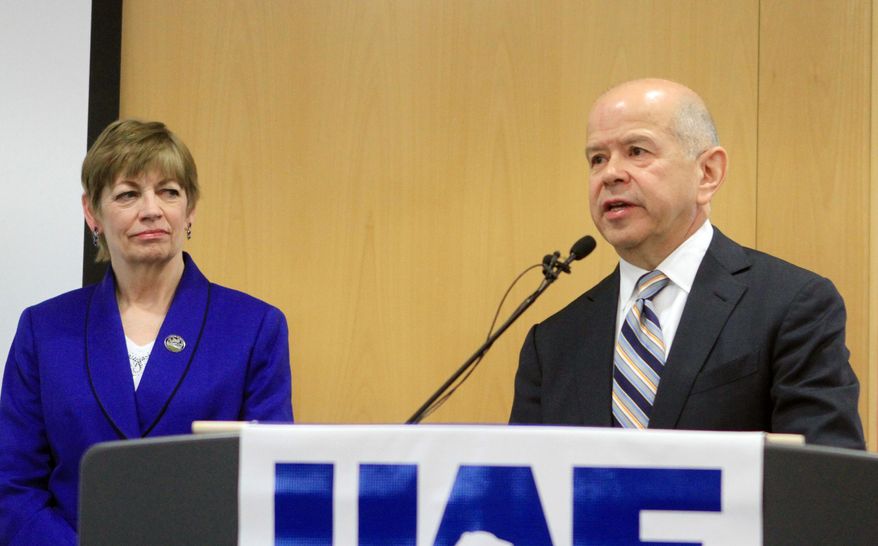 Federal Aviation Administration Administrator Michael Huerta and Pan Pacific Unmanned Aircraft Systems Test Range Complex director Ro Bailey answer questions at a press conference at the University of Alaska Anchorage on Monday, May 5, 2014, in Anchorage, Alaska. Huerta announced that the FAA has authorized unmanned aircraft test flights at UA Fairbanks. The university is one of six locations picked for research into into integrating drones into U.S. airspace (AP Photo/Dan Joling)