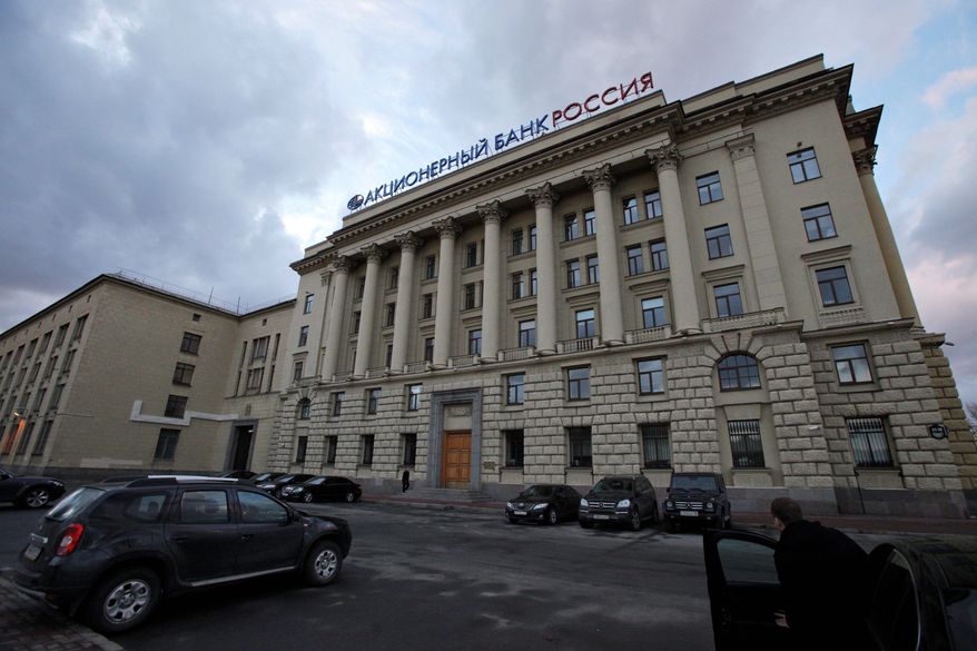 Two Russian banks, including Bank Rossiya, the lender that was put on the U.S. Treasury's sanctions list, said Visa and MasterCard have stopped providing services to them. Bank Rossiya is a private bank owned by Yuri Kovalchuk, considered to be Russian President Vladimir Putin's longtime friend and banker. With about $10 billion in assets, Rossiya ranks as the 17th-largest bank in Russia and maintains numerous ties to banks in the United States, Europe and elsewhere. (Associated Press)