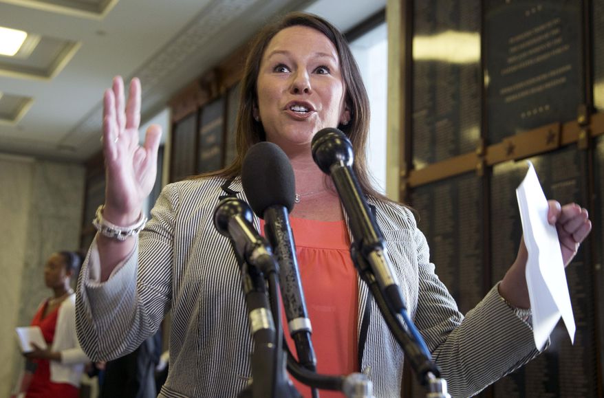 FILE - In this May 21, 2013, file photo, Rep. Martha Roby, R-Ala., speaks to the reporters on Capitol Hill in Washington, Tuesday, May 21, 2013. Republicans hoping to ride Benghazi to a November sweep of midterm elections have entrusted a seven-member team, including Roby, with "getting to the truth," in the words of House Speaker John Boehner, on whether the Obama administration misled Americans about the deadly attack. (AP Photo/Manuel Balce Ceneta, File)