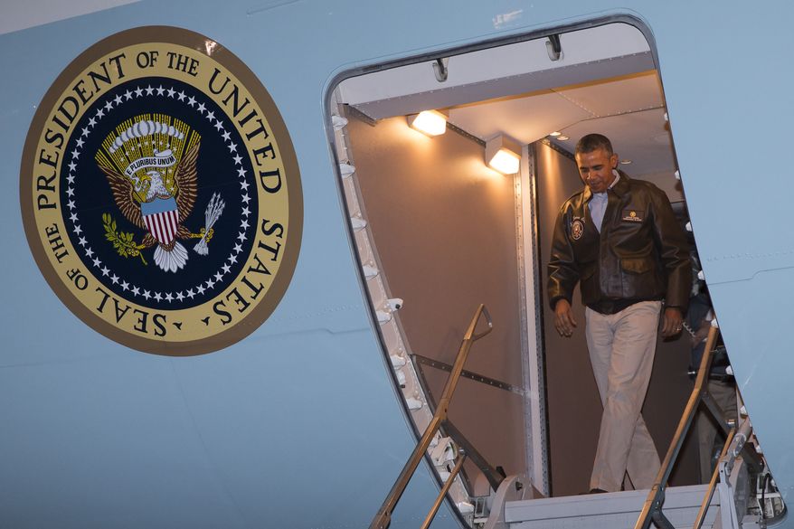 President Barack Obama steps off Air Force One after arriving at Bagram Air Field for an unannounced visit, on Sunday, May 25, 2014, north of Kabul, Afghanistan. (AP Photo/ Evan Vucci)