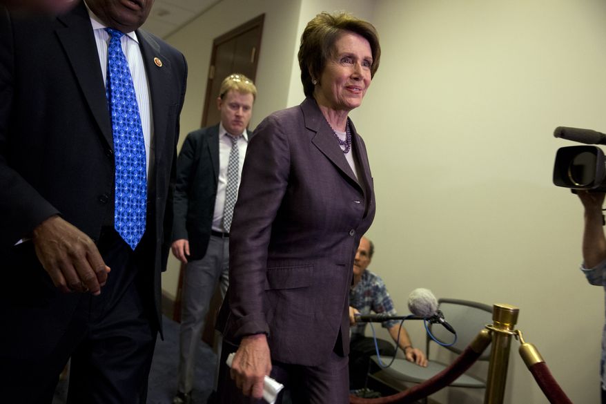 **FILE** House Minority Leader Nancy Pelosi, California Democrat, arrives May 9, 2014, for a House Democratic caucus on Capitol Hill in Washington. (Associated Press)