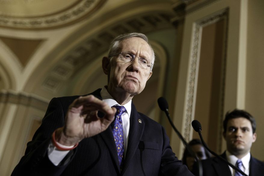 Senate Majority Leader Harry Reid of Nev. speaks to reporters on Capitol Hill in Washington, Tuesday, June 3, 2014, following a Democratic caucus lunch. (AP Photo/J. Scott Applewhite)