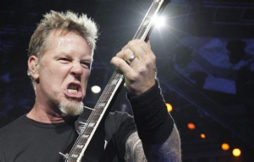 ** FILE ** Metallica'S James Hetfield performs at the World Magnetic tour in Vilnius, Lithuania, April 20, 2010. (Associated Press)