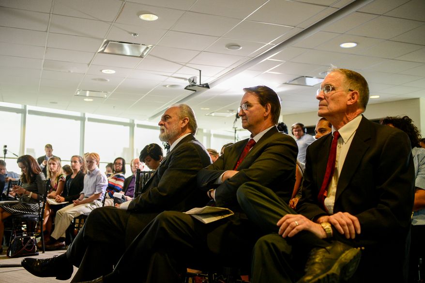 Left to Right: President and CEO Larry Beasley, Operations Holdings Group/The Washington Times Chairman Dr. Michael Jenkins, and CFO for the Washington Times Keith Cooper listen as Sen. Mike Lee (R-UT), Privacy and Civil Liberties Oversight Board Chairman David Medine, moderator and Washington Times Opinion Editor David Keene, Former NSA and CIA Director Gen. Mike Hayden, and American Civil Liberties Union (ACLU) Washington Legislative Office Director Laura W. Murphy, speak on a panel called "Privacy in America: the NSA, the Constitution and the USA Freedom Act" at the Microsoft Innovation and Policy Center, Washington, D.C., Thursday, June 12, 2014. (Andrew Harnik/The Washington Times)