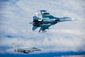 Typhoon shadows Su27.jpg