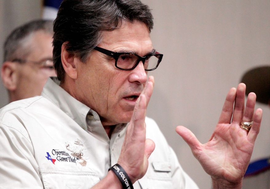 Texas Gov. Rick Perry said the border is less secure than in recent years and that the surge of minors crossing into the U.S. illegally has become a major distraction for immigration agents. (Associated Press)